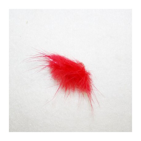 Pompón de pelo rojo